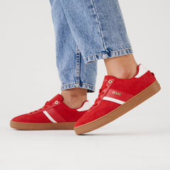 Guess Naoko sneakers feature a suede upper and a classic gum rubber sole.