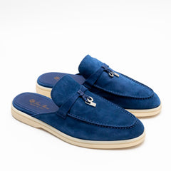 Loro Piana Summer Charms Walk suede mules in a deep blue finish, accented with the brand's