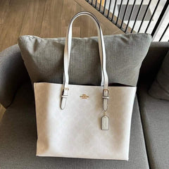 Coach Mollie Tote in Signature Canvas Chalk, featuring a subtle tonal monogram pattern