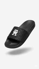 Tommy Hilfiger Monogram Embossed Slides