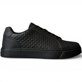 black Calvin Klein Jeans textured lace-up sneakers feature embossed detailing
