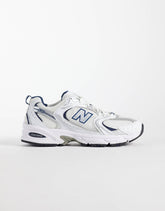 New Balance 530 sneakers in a white and navy