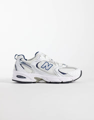 New Balance 530 sneakers in a white and navy