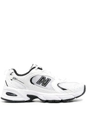 New Balance 530 sneakers in white with black
