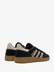 Adidas Handball Spezial Black Wonder Leopard sneakers, featuring a distinct leopard print on the three stripes.