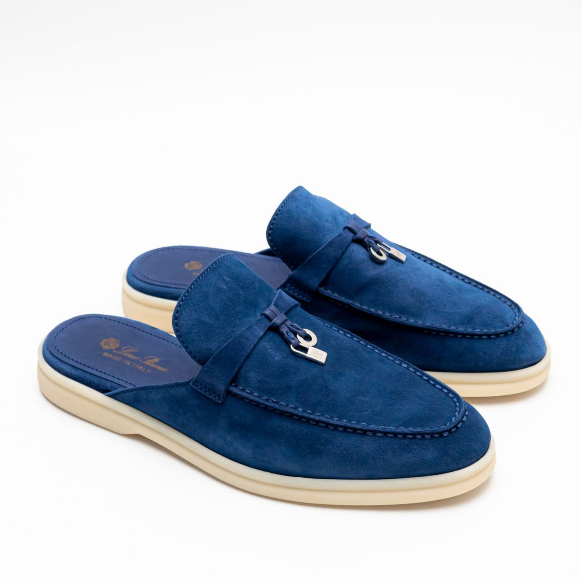 Loro Piana Summer Charms Walk suede mules in a deep blue finish, accented with the brand's