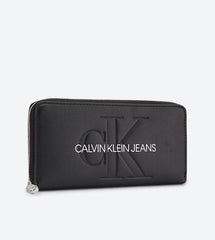 Calvin Klein Jeans zip-around wallet features a black faux-leather