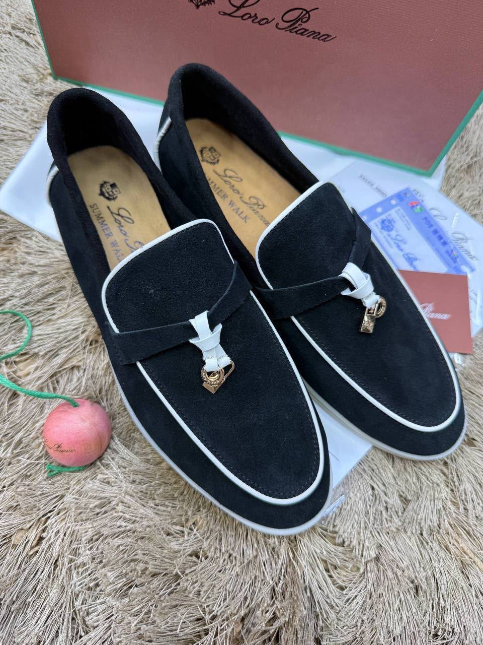 Loro Piana Summer Charms Walk loafers in black suede, accented with crisp white piping