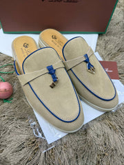 Loro Piana Summer Charms Walk Babouche Mules crafted in beige suede with striking blue contrast piping