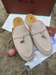 Loro Piana Babouche Charms Walk suede mules featuring a neutral beige upper accented with vibrant pink