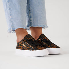 Guess Jelexa9 sneakers, featuring a bold brown leopard print with sleek black trim and gold