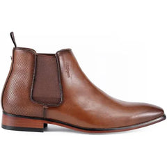 leather Chelsea boots, similar in style to those offered by brands like Tommy Hilfiger or Colorado Craftsman.
