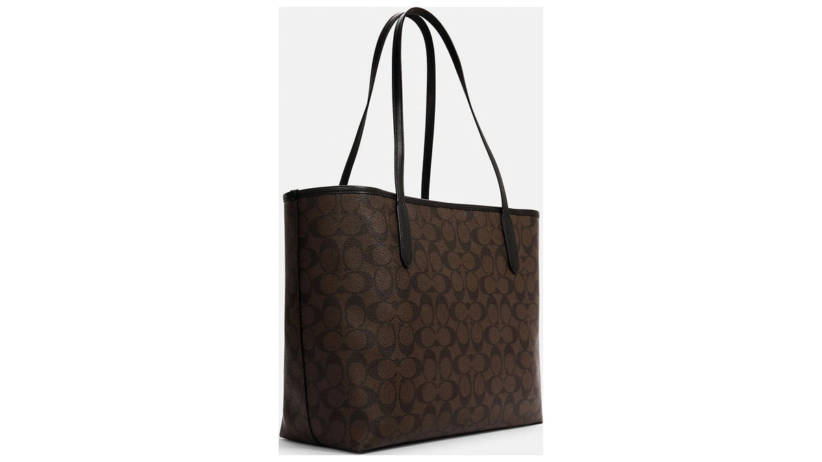 Coach Women's City Tote bag in brown/black signature coated canvas.