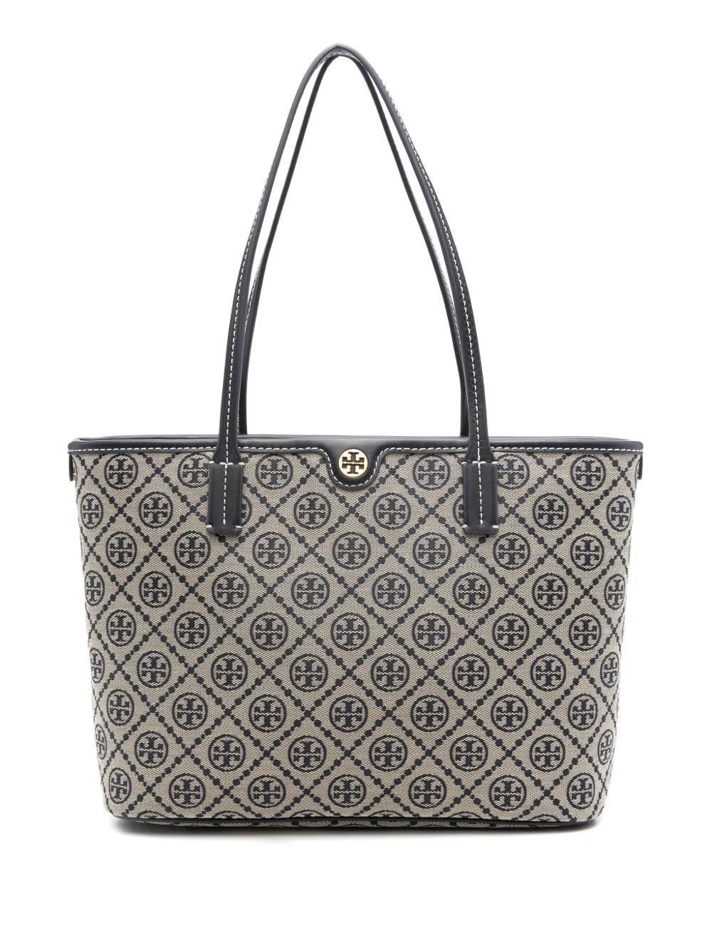 Tory Burch T Monogram Small Zip Tote featuring a woven navy blue jacquard pattern and leather trim.
