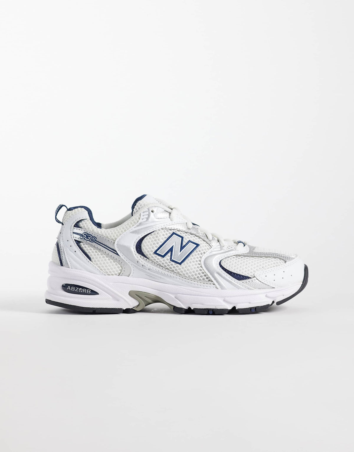 New Balance 530 sneakers in a white and navy
