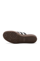 Adidas Samba OG shoes in white with black stripes.