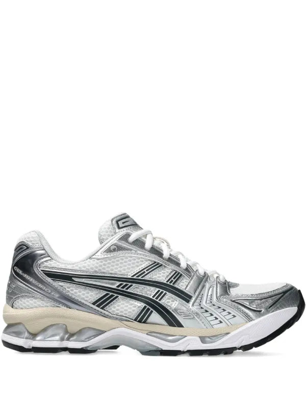 ASICS GEL-KAYANO 14 sneaker, shown here in the White/Midnight colorway, features layered