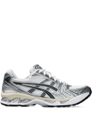 ASICS GEL-KAYANO 14 sneaker, shown here in the White/Midnight colorway, features layered