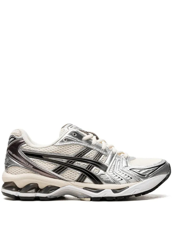 ASICS GEL-KAYANO 14 sneaker, shown here in the White/Midnight colorway,
