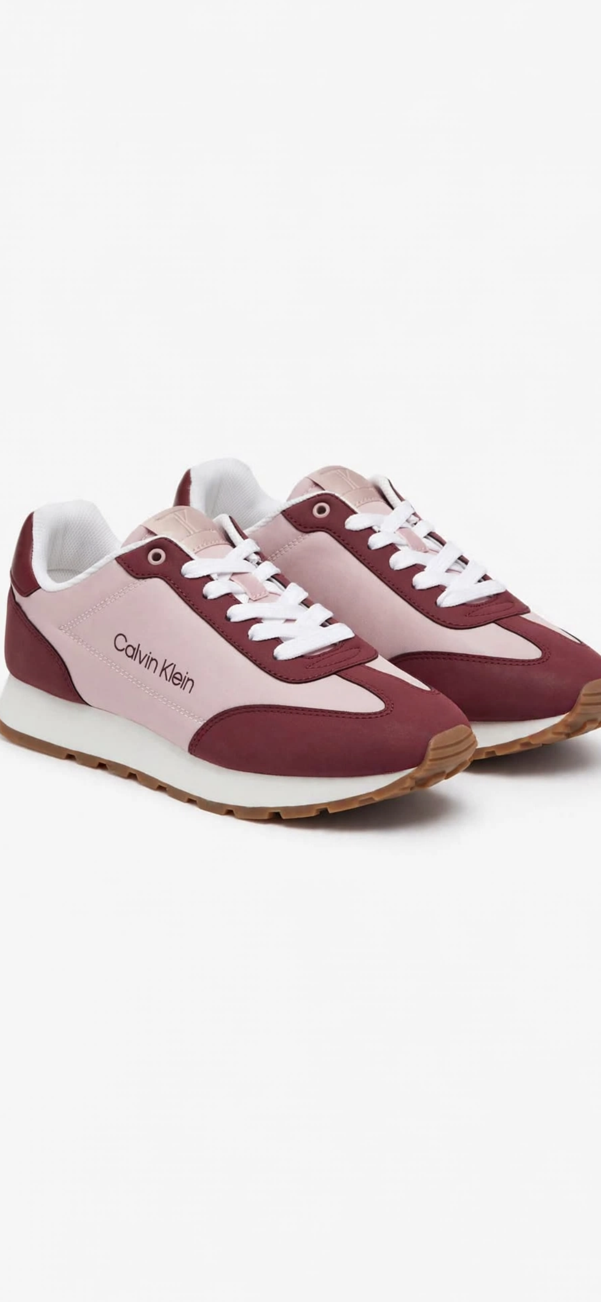 Calvin Klein women's sneakers featuring a minimalist pink and maroon