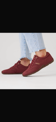 Guess Gabiey sneakers featuring a prominent triangle logo detail on the side.