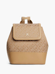 Tommy Hilfiger monogram jacquard flap backpack featuring a classic tan and brown